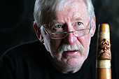 Musician Dr Richard Nunns with a putorino, a traditional Maori instrument or taonga puoro in - BH2ECP